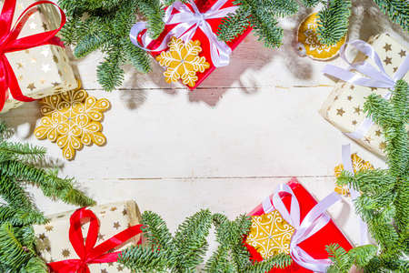 Traditional Christmas greeting card background. White and red gift boxes with festive ribbons,...
