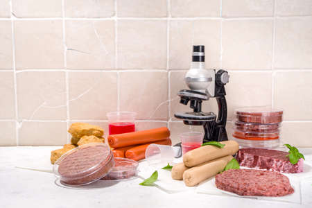 Lab grown meat alternatives concept, Various grown meat types red and white meat with microscope,...