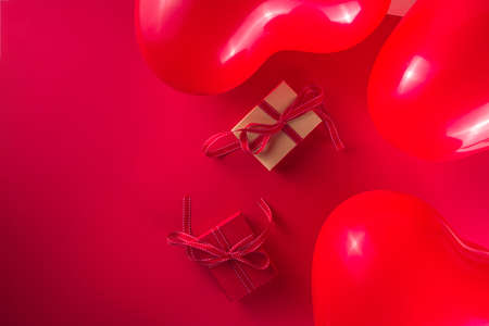 Valentine day sweet holiday background with red heart shaped balloons on red background, with...