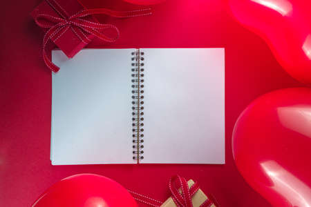 Valentine day sweet holiday background with red heart shaped balloons on red background, with...