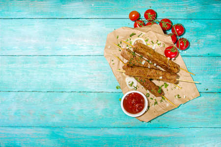 Lula kebab, shish kebab on wood skewer with minced beef, grill and bbq conceptの写真素材