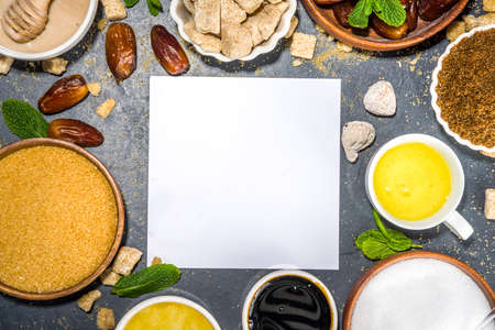 Various healthy diet replacement for sugar, natural organic sweetener concept, anti diabetes non-glycemic, sweetener. Various fruit sweet syrups, molasses, stevia, dates, coconut and date sugar, maple syrupの写真素材