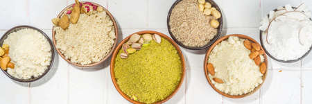 Alternative Nut Flour. Various keto paleo gluten, grain free flour source set, natural nut-based vegan baking. Almond, coconut, brazil nut, macadamia, walnut, cashew, pistachio, hazelnut, peanut flourの写真素材