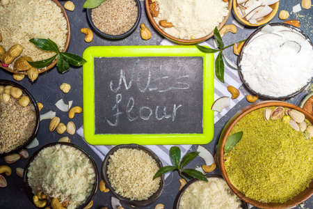 Alternative Nut Flour. Various keto paleo gluten, grain free flour source set, natural nut-based vegan baking. Almond, coconut, brazil nut, macadamia, walnut, cashew, pistachio, hazelnut, peanut flourの写真素材
