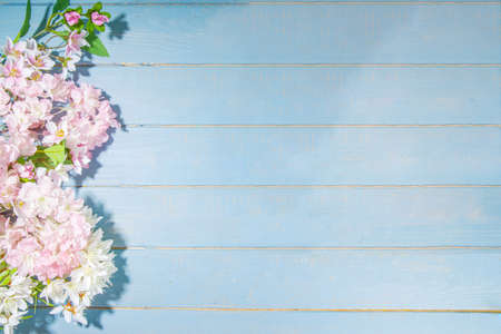hello spring concept. Spring holidays greeting card simple flatlay background with artificial...