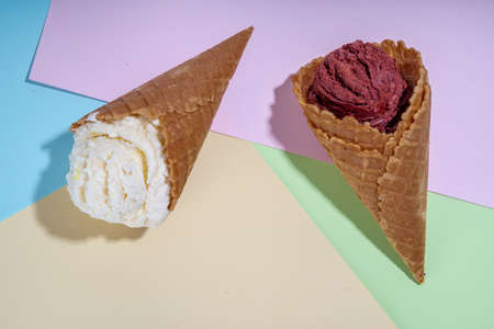 Collection of bright ice cream in waffle cones, Set of various flavor ice cream on colorful...