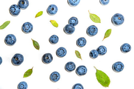 Fresh blueberries and leaves, berry background frame isolated on white background, top viewの写真素材