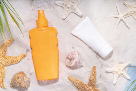 Sunscreen suncare background. Mockup background with vacation accessory, suntan lotion bottle,...