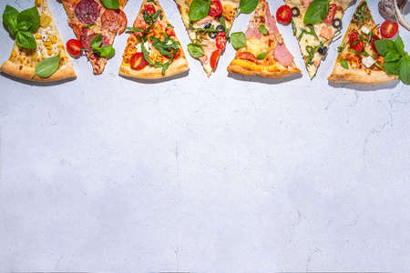 Various taste type pizza slices with different traditional filling - seafood fish salmon, Hawaiian with chicken, vegetarian vegetable margarita, meat carbonara, salami on white backgroundの写真素材