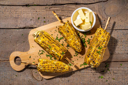 Sweet corn grilled with butter, cheese, cilantro and herbs. Vegetarian, healthy, clean eating...