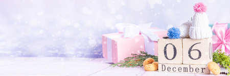 Sinterklaas, Saint Nicholas day background. Kids winter hats, block calendar with December 6 date,...