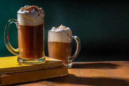 Sweet Homemade Butterscotch Butter Beer, non-alcohol beer styled caramel autumn winter drink, with...