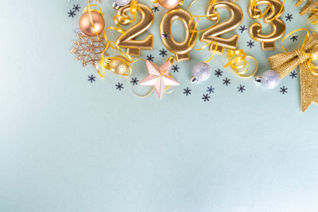 New year 2023 celebration greeting card background Gold numbers 2023 with golden party decoration,...