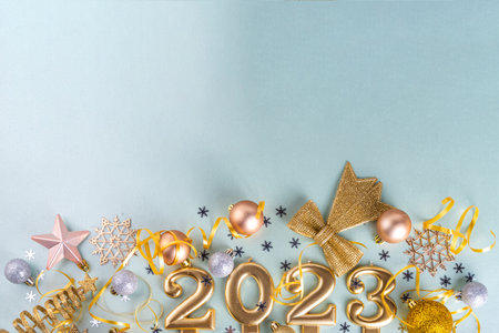 New year 2023 celebration greeting card background Gold numbers 2023 with golden party decoration,...