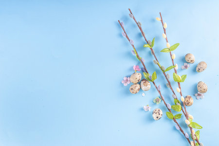 Spring Easter holiday top view background with eggs and willow flowers. Simple Happy Easter ...