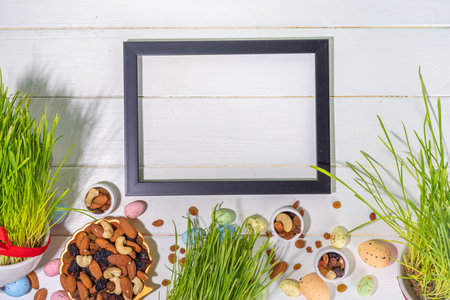 Happy Nowruz holiday background. Celebrating Nowruz new year sweets and treats, dried fruits, nuts,...