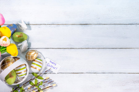 Spring Easter holiday greeting card background. Willow spring flower branches, colorful green,...
