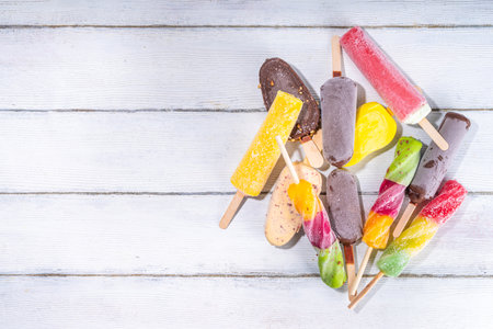 Various ice creams on turquoise wooden background, summer sweets, dessert, vacation and holiday backgroundの写真素材