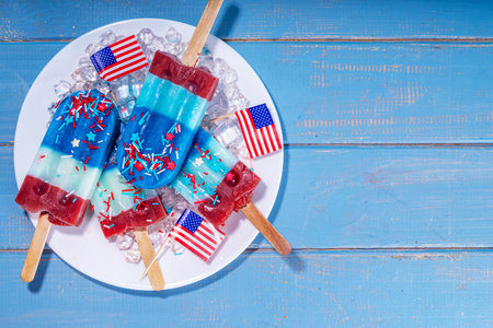 Red, white and blue ice pops.  Patriotic USA lollypops ice cream for july 4 party or bbq picnicの写真素材