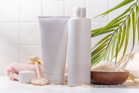 Rice Shampoo and Conditioner, organic rice water hair care. Natural beauty, organic fermented cosmetics with rice grains on background copy spaceの写真素材