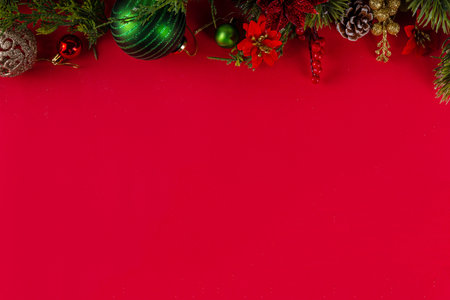 High-colored Christmas and New Year background with Christmas tree branches, fir spruce, baubles,...
