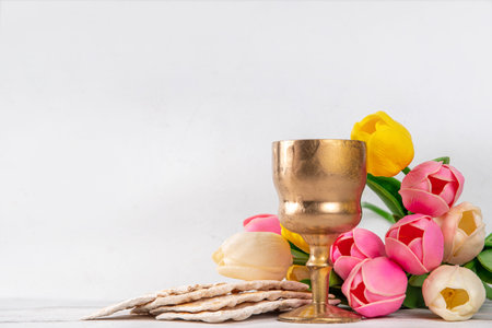 Passover celebration background. Traditional ritual Jewish bread matzah, red kosher wine, walnut,...