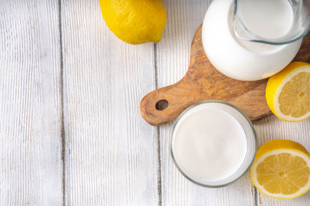 Homemade kefir, buttermilk or yogurt. Healthy probiotics prebiotic fermented dairy drinkの写真素材