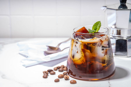 Coffee Jelly Dessert made with strong espresso coffee, gelatin or agar and whipped cream. Asian cold...