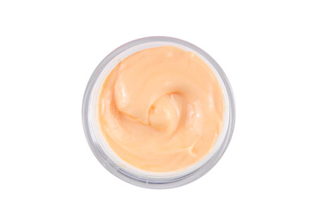 Orange citrus Vitamin C face care - cream, serum. mask, face cleaner, antioxidant moisturizer skin face care and make up concept, with fresh orange fruit slicesの写真素材