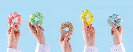 Asian trendy mochi donuts dessert. Sweet colorful mochi donuts baked pastry, with various toppings and fillingsの写真素材