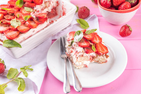 Summer strawberry tiramisu dessert, Berry fruit version of summer tiramisu cake with fresh strawberry, mascarpone and savoyardiの写真素材