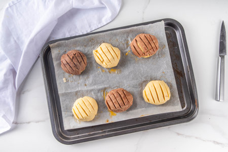 Cooking making mexican traditional conchas pastry, cookie or bread buns. Homemade preparation of...