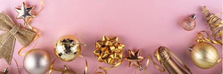 Merry Christmas and Happy New Year 2025 background with golden bauble, Christmas tree balls and decorations, gift bow, serpentine, 2025 golden candles numbers, flat lay top view copy spaceの写真素材