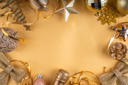 Merry Christmas and Happy New Year 2025 background with golden bauble, Christmas tree balls and decorations, gift bow, serpentine, 2025 golden candles numbers, flat lay top view copy spaceの写真素材