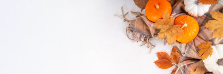 Minimal sparse autumn background with fall leaves top view copy space