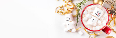 Christmas hot chocolate with funny dancing snowman creative made with marshmallows, greeting card on Christmas hot drinks menu backgroundの写真素材