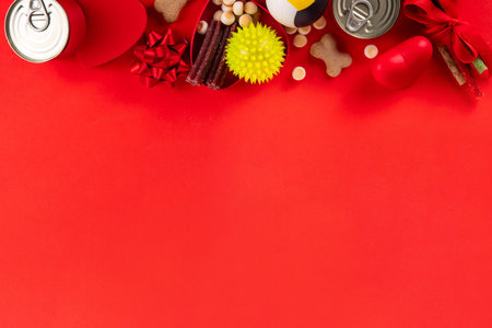 Pets Valentine day holiday shopping and gifts background with tasty snacks, foods, bone, dog and cat...