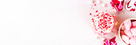 Valentine day pink hot chocolate or milkshake, tasty sweet red velvet, or berry sweet chocolate drink, milk protein shake with a lot of whipped cream, heart shaped marshmallow and sugar sprinklesの写真素材