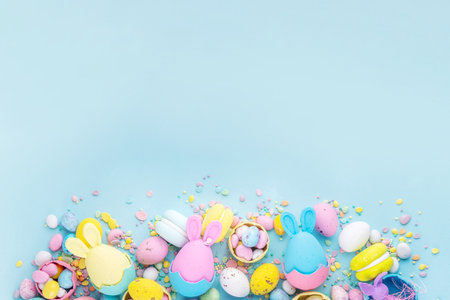 Cute and bright pastel colored Easter eggs and bunny background. Pink. blue, yellow colored bunny...