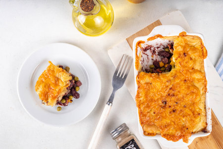 Vegan Sheppard Pie Recipe. Traditional pie with mashed potatoes, with base of legumes, beans and corn instead of meat. Vegan source of protein, balanced lunch or dinner ideaの写真素材