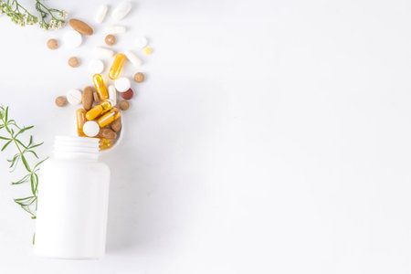 Homeopathic medicine pills, various colorful medicine pills and capsules, dietary supplements with herbs and plants.. Natural and alternative medicine, Eco organic medicine conceptの写真素材