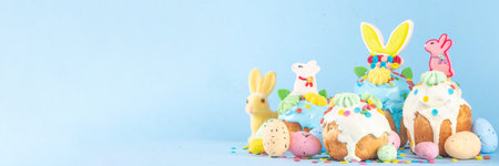 Bright colorful Easter cakes, pastries and eggs greeting card background with copy space,  Easter...