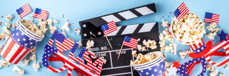 Memorial Day, Independence Day Fourth of July movie marathon, for American holidays, Movie Night party. Cinema clapper-board, Popcorn in Patriotic Cup,  American flag  decoration, accessories, glassesの写真素材
