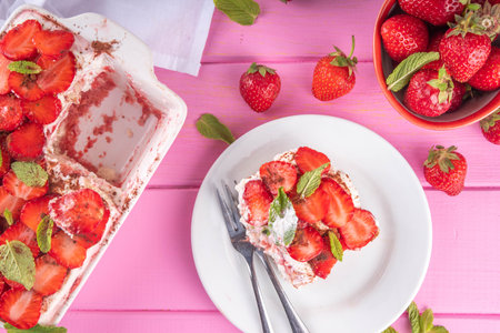 Summer strawberry tiramisu dessert, Berry fruit version of summer tiramisu cake with fresh strawberry, mascarpone and savoyardiの写真素材