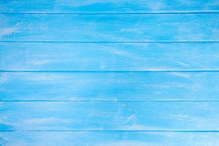 Light blue wooden background, wooden textured colored in blue and white, top view surface copy spaceの写真素材