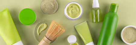 Matcha Skincare Cosmetics Background containing matcha powder, cream, serum, face mask, scrub, toner and moisturizer, natural clean beauty anti-aging skin care beauty trendの写真素材