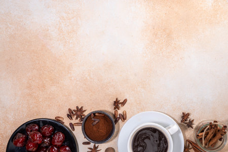 Healthy organic date seed coffee, black coffee cup, made with grated date seeds, with whole date fruits and seeds on beige background . Alternative coffee hot drinkの写真素材