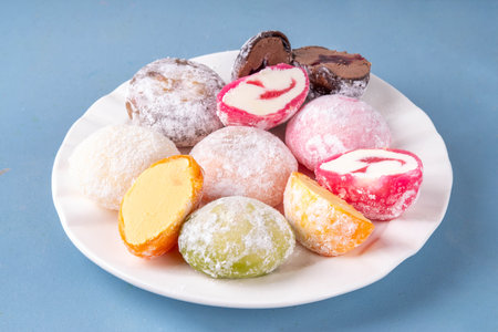 Various colorful fruit and berry mochi assortment. Traditional Japanese sweet dessert in rice dough, copy spaceの写真素材
