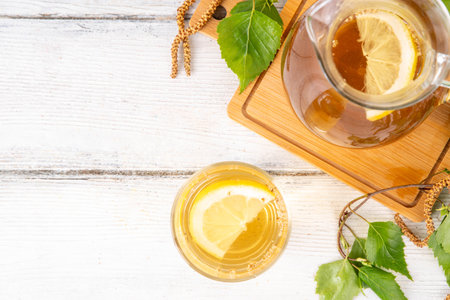 Cold birch tea, birch sap summer refreshment drink with honey and lemon. Infused detox beverageの写真素材