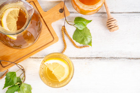 Cold birch tea, birch sap summer refreshment drink with honey and lemon. Infused detox beverageの写真素材